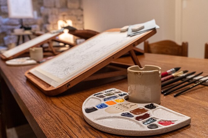 Cinematic Watercolor Workshop and Tea Experience at Boma Café - Professional tools on a handcrafted desk
