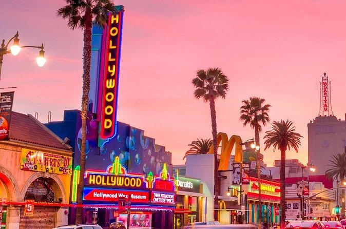 Hollywood and Beverly Hills Bus Tour - Entertainment, traffic, and the guide in the front seat
