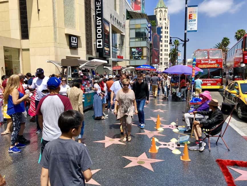 Los Angeles: Hollywood and Beverly Hills Guided Bus Tour - Sunset Strip after dark or in daylight