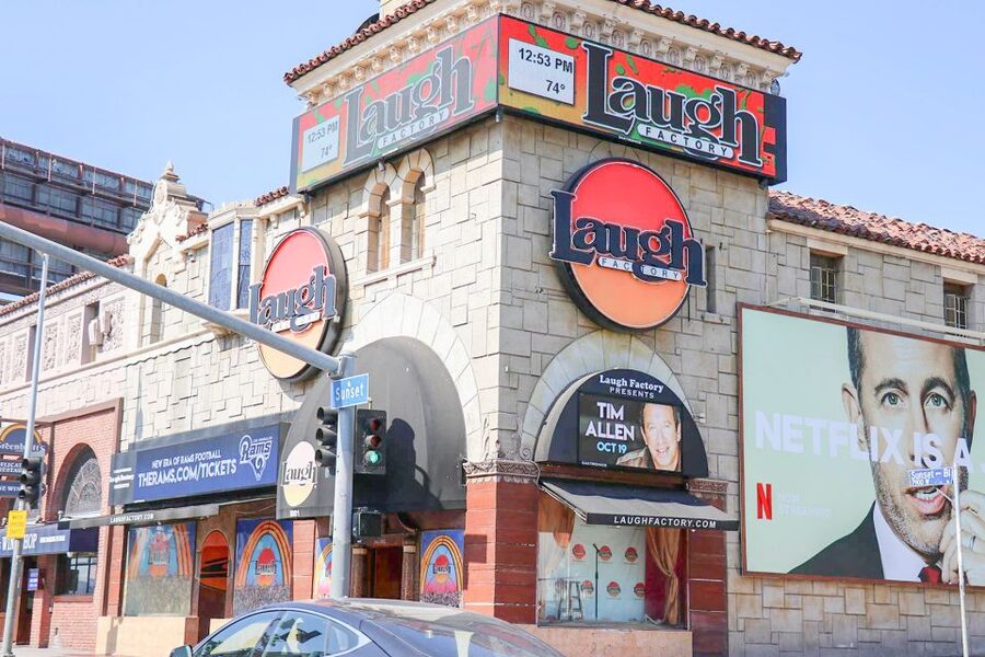 Los Angeles: Hollywood & Celebrity Homes Open-Air Bus Tour - Hollywood Boulevard, where the movie-business symbols pile up