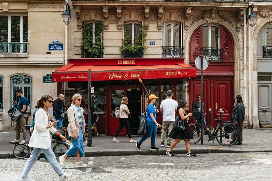 Paris: Emily TV Show Locations Guided Walking Tour - Crossing Pont des Arts for Seine views